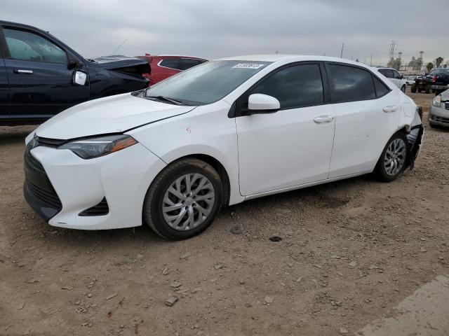 TOYOTA COROLLA L 2018 with VIN 2T1BURHE1JC104411 - Photo from auction