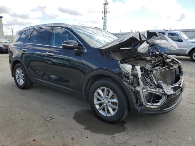 Photo 4 from auction – 2016 KIA SORENTO LX with VIN 5XYPG4A33GG070252