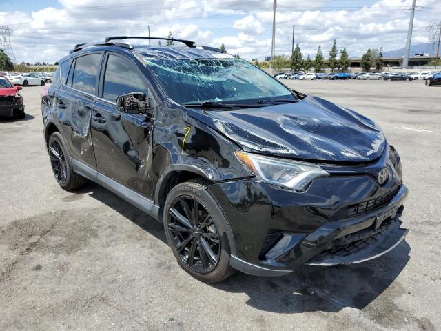 Photo 4 from auction – 2018 TOYOTA RAV4 LE with VIN 2T3ZFREV5JW436936