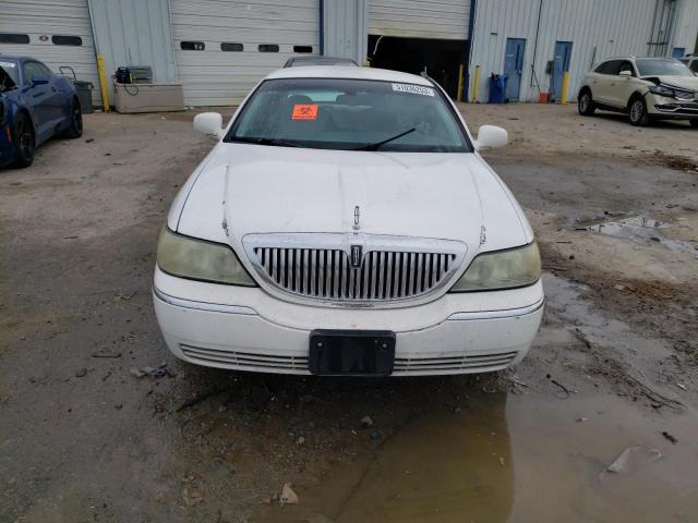 Photo 5 from auction – 2004 LINCOLN TOWN CAR E with VIN 1LNHM81W44Y629949