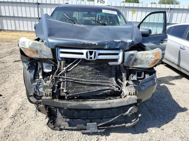 Foto 12 de la subasta – 2006 HONDA PILOT EX con VIN 5FNYF28566B031650