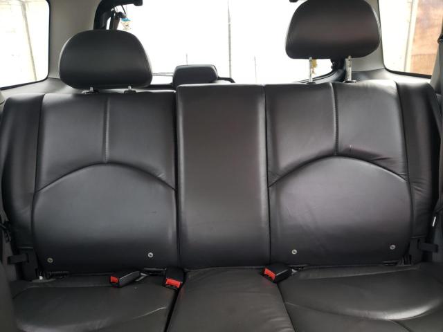 Photo 10 from auction – 2004 MAZDA TRIBUTE ES with VIN 4F2CZ06174KM11019