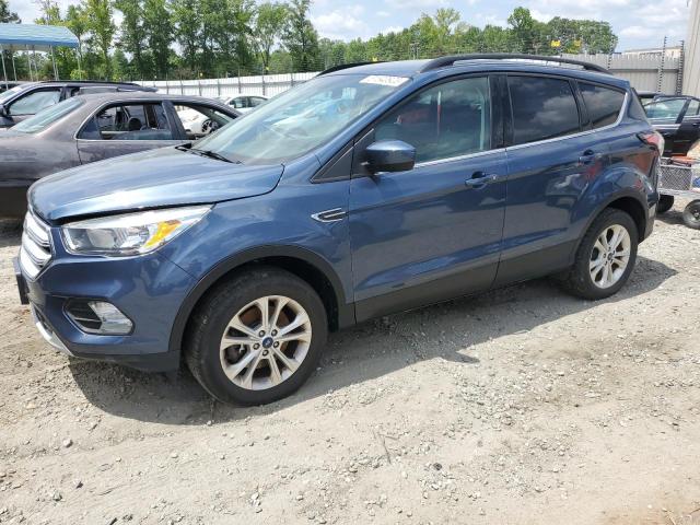 FORD ESCAPE SE 2018 with VIN 1FMCU9GD5JUB22227 - Photo from auction