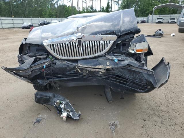 Photo 11 from auction – 2003 LINCOLN TOWN CAR E with VIN 1LNHM81W73Y611721
