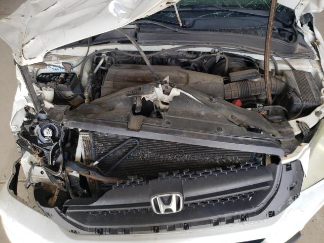 Photo 12 from auction – 2004 HONDA PILOT EXL with VIN 2HKYF18574H518218
