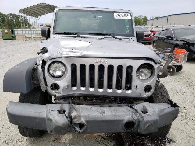 Photo 5 from auction – 2014 JEEP WRANGLER U with VIN 1C4BJWFG6EL118900