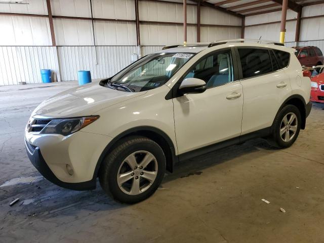 TOYOTA RAV4 XLE 2014 with VIN JTMRFREV9ED062415 - Photo from auction