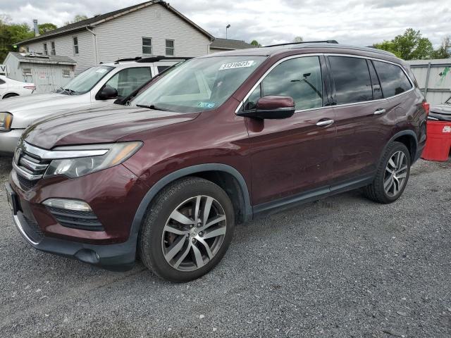 HONDA PILOT TOUR 2016 with VIN 5FNYF6H96GB061162 - Photo from auction