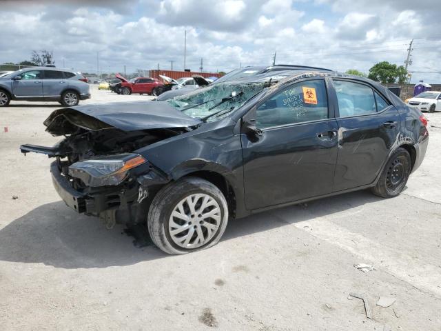 TOYOTA COROLLA L 2018 with VIN 5YFBURHE5JP745870 - Photo from auction