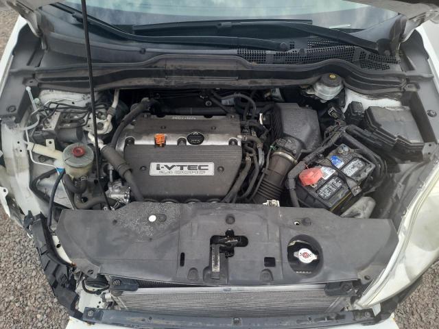 Photo 12 from auction – 2007 HONDA CRV with VIN JHLRE38767C066012