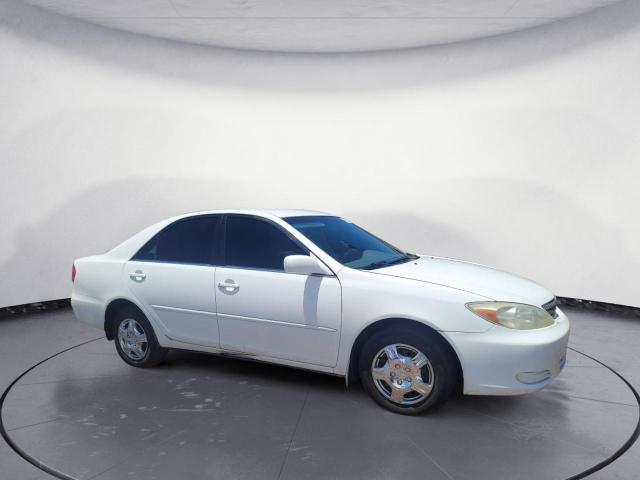 Photo 4 from auction – 2002 TOYOTA CAMRY LE with VIN JTDBE32K520045299