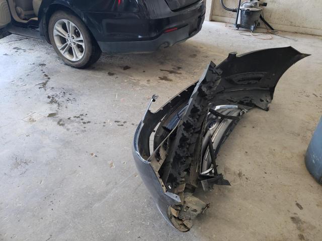 Photo 12 from auction – 2015 FORD TAURUS SE with VIN 1FAHP2D92FG160020
