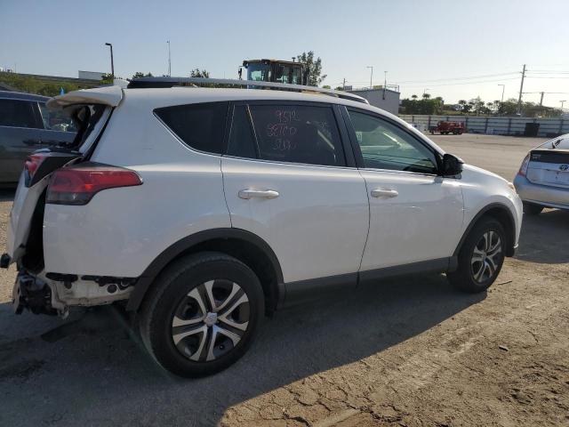 Photo 3 from auction – 2017 TOYOTA RAV4 LE with VIN JTMZFREV1HJ701473