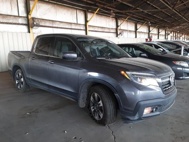 Photo 4 from auction – 2019 HONDA RIDGELINE with VIN 5FPYK3F53KB021129