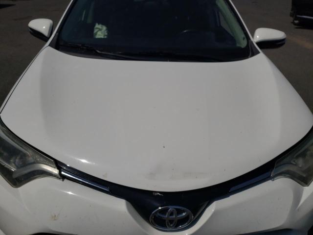 Photo 12 from auction – 2016 TOYOTA RAV4 XLE with VIN JTMRFREV8GJ088640