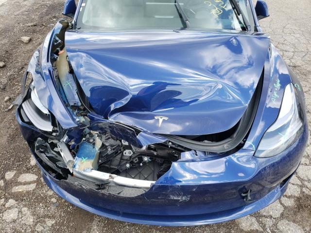Photo 11 from auction – 2022 TESLA MODEL 3 with VIN 5YJ3E1EA5NF303838
