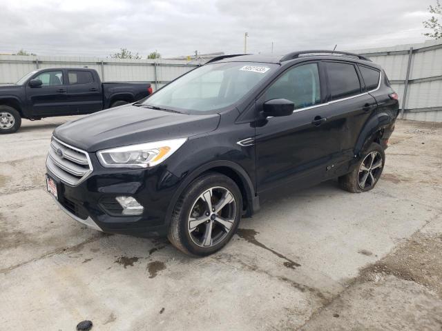 FORD ESCAPE SEL 2018 with VIN 1FMCU9HD6JUA19655 - Photo from auction