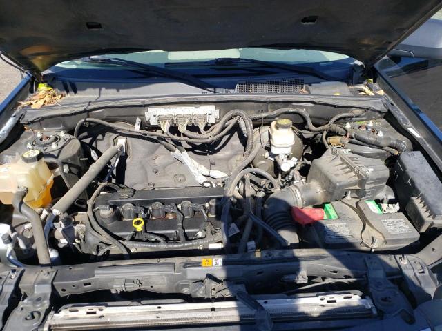 Photo 11 from auction – 2009 MERCURY MARINER with VIN 4M2CU81759KJ24014