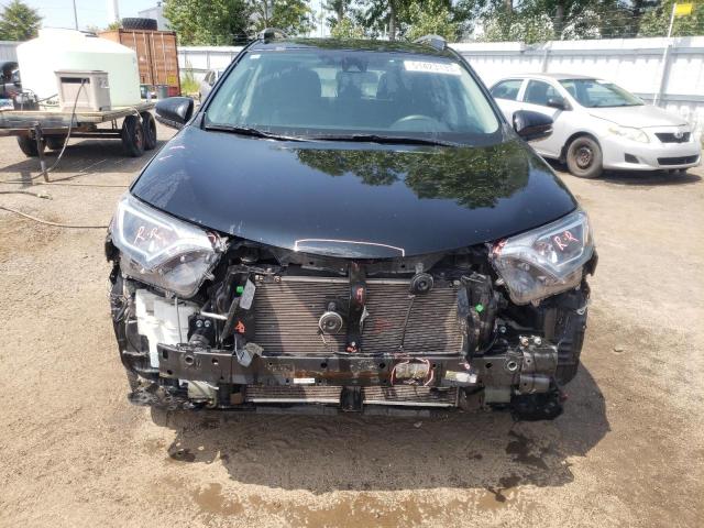 Photo 5 from auction – 2018 TOYOTA RAV4 LE with VIN 2T3ZFREV2JW474074