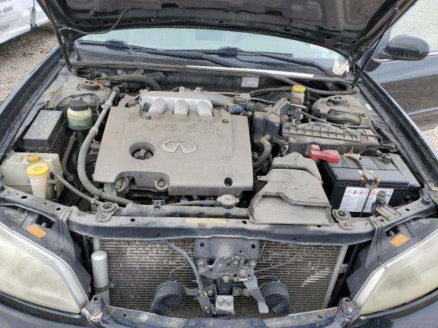Photo 11 from auction – 2002 INFINITI I35 with VIN JNKDA31A62T029011