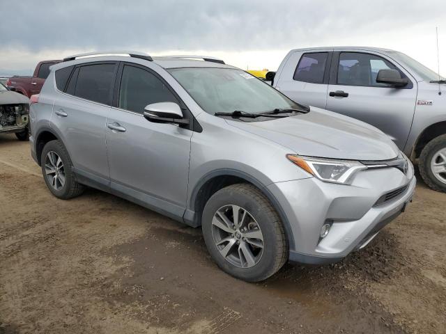 Photo 4 from auction – 2016 TOYOTA RAV4 XLE with VIN 2T3RFREV8GW465856