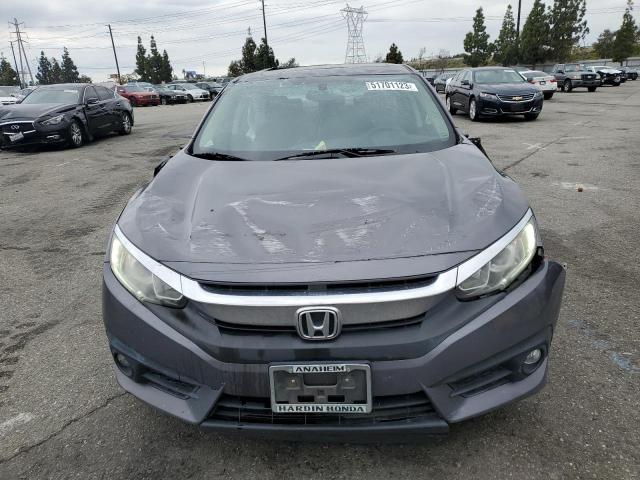 Photo 5 from auction – 2016 HONDA CIVIC EX with VIN 2HGFC1F37GH653411