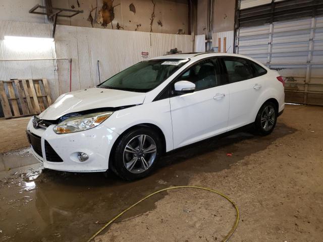 FORD FOCUS SE 2014 with VIN 1FADP3F27EL169712 - Photo from auction