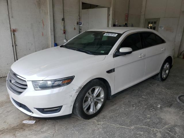 FORD TAURUS SEL 2014 with VIN 1FAHP2E87EG174371 - Photo from auction