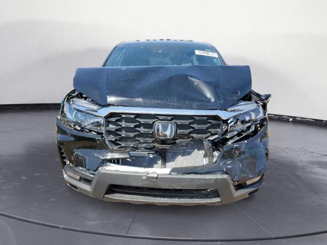 Photo 5 from auction – 2023 HONDA PASSPORT E with VIN 5FNYF8H53PB013983