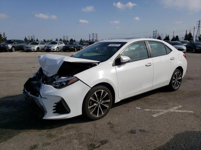 TOYOTA COROLLA L 2018 with VIN 5YFBURHE6JP839269 - Photo from auction