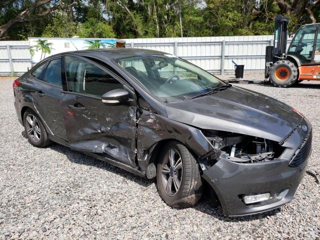 Photo 4 from auction – 2017 FORD FOCUS SE with VIN 1FADP3FE9HL305904