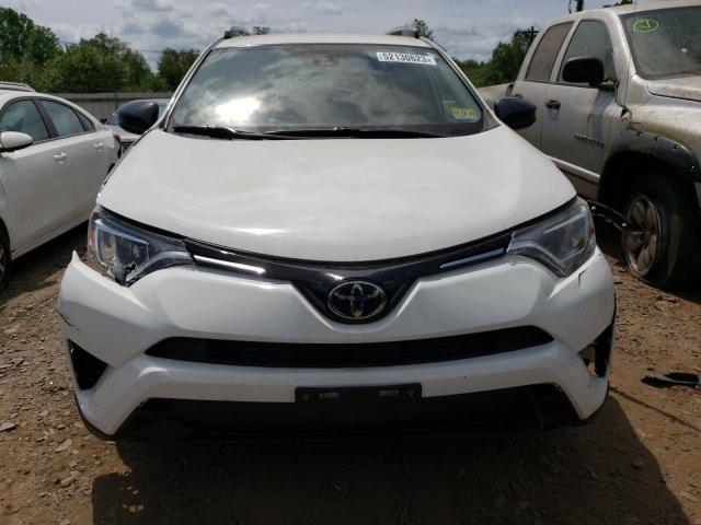 Photo 5 from auction – 2017 TOYOTA RAV4 LE with VIN JTMBFREV8HD200189