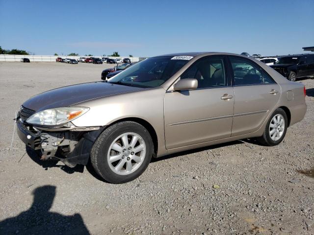 TOYOTA CAMRY LE 2002 with VIN 4T1BE32K42U581438 - Photo from auction