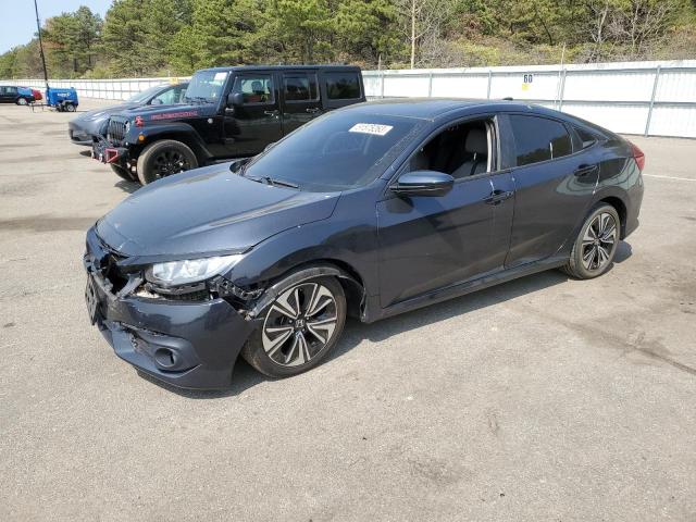 HONDA CIVIC EX 2018 with VIN JHMFC1F34JX009297 - Photo from auction