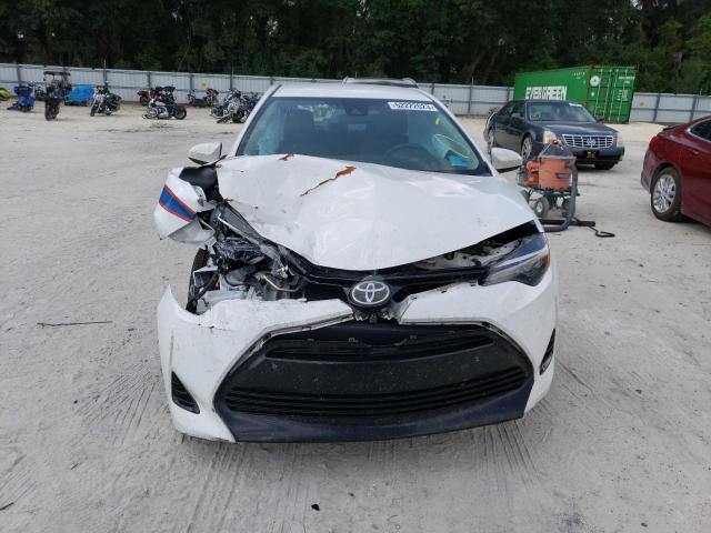 Photo 5 from auction – 2017 TOYOTA COROLLA L with VIN 5YFBURHE6HP721233