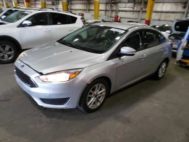 FORD FOCUS SE 2016 with VIN 1FADP3F20GL214329 - Photo from auction