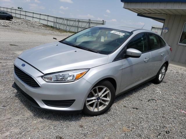FORD FOCUS SE 2018 with VIN 1FADP3F22JL327903 - Photo from auction
