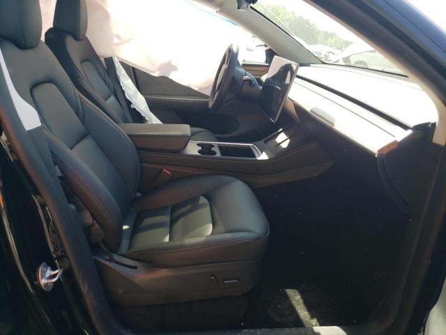 Photo 7 from auction – 2023 TESLA MODEL Y with VIN 7SAYGDEE9PF692560