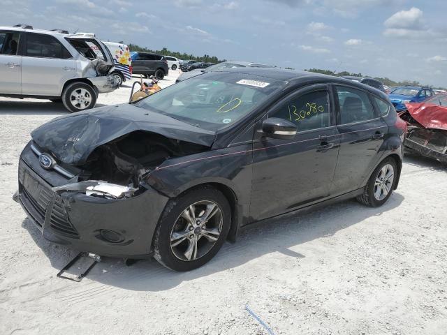 FORD FOCUS SE 2014 with VIN 1FADP3K23EL128113 - Photo from auction