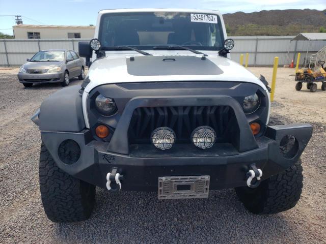Photo 5 from auction – 2011 JEEP WRANGLER U with VIN 1J4BA3H10BL619861