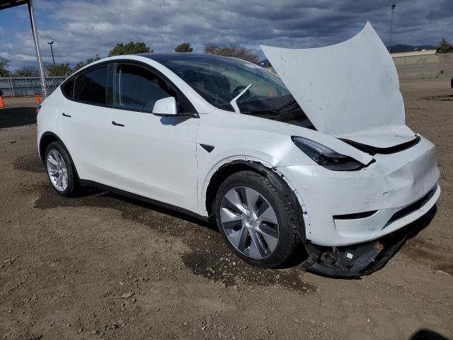 Photo 4 from auction – 2023 TESLA MODEL Y with VIN 7SAYGDEE6PA083651