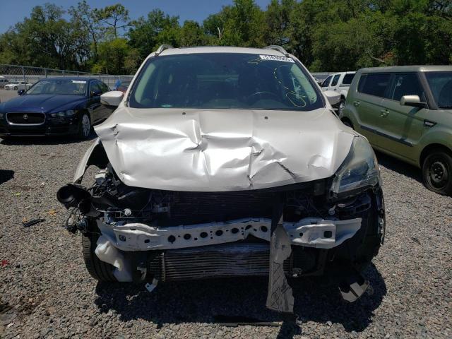Foto 5 de la subasta – 2015 FORD ESCAPE TIT con VIN 1FMCU0J97FUC87624