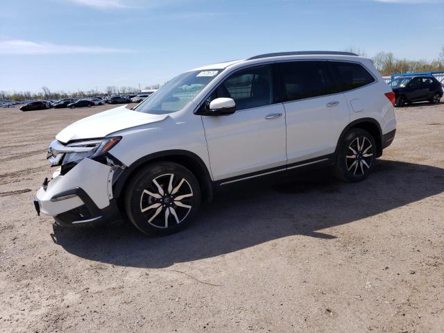 HONDA PILOT TOUR 2021 with VIN 5FNYF6H97MB507380 - Photo from auction