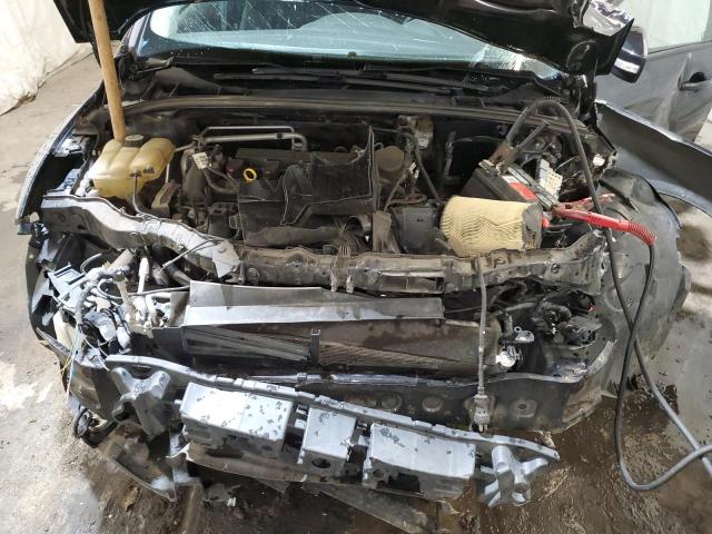 Photo 11 from auction – 2013 FORD FOCUS SE with VIN 1FADP3K20DL228376