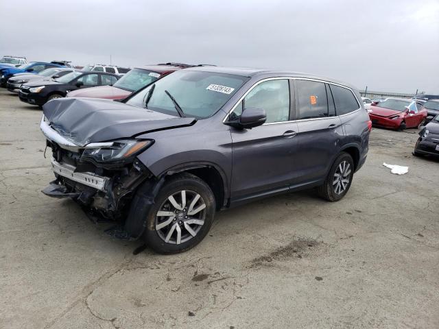 HONDA PILOT EXL 2019 with VIN 5FNYF5H53KB021458 - Photo from auction