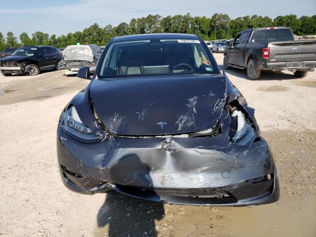 Photo 5 from auction – 2022 TESLA MODEL Y with VIN 7SAYGDEE2NF386085