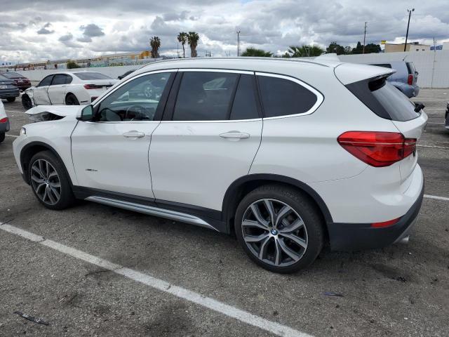 Photo 2 from auction – 2017 BMW X1 XDRIVE2 with VIN WBXHT3C30H5F78539