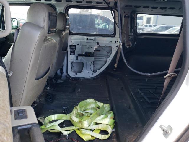 Фото 11 с аукциона – 2003 HUMMER H2 с VIN 5GRGN23UX3H146873