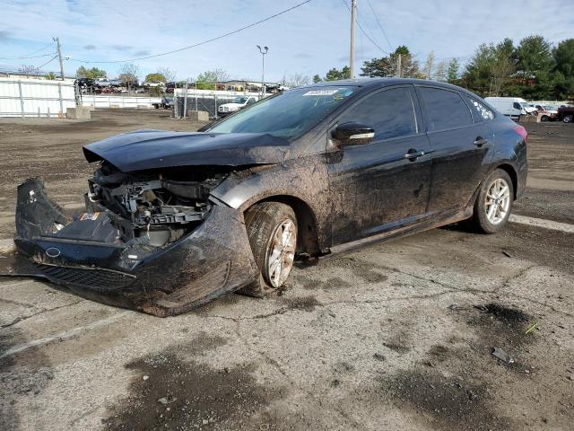 FORD FOCUS SE 2016 with VIN 1FADP3F22GL240303 - Photo from auction