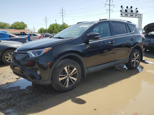 TOYOTA RAV4 2018 with VIN 2T3RFREV1JW826075 - Photo from auction